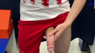 Horny guy in the locker room of the store jerks off a big dick.